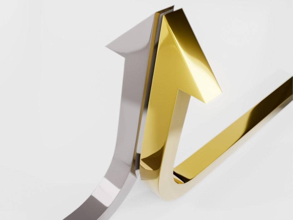 Shining silver and golden arrows moving upward