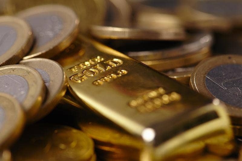 Gold bar and coins