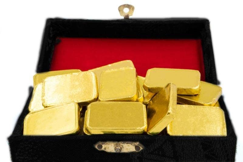 gold bars in black box