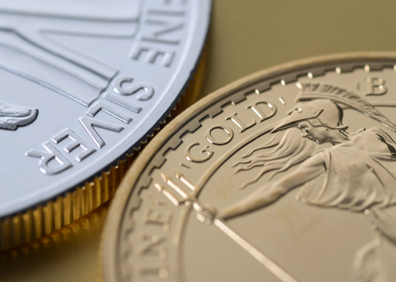 gold silver coins next to each other