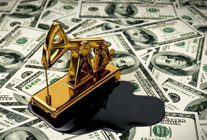 Gold momento sitting on the paper money
