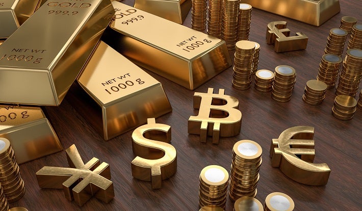 Gold bullion with different currency symbols
