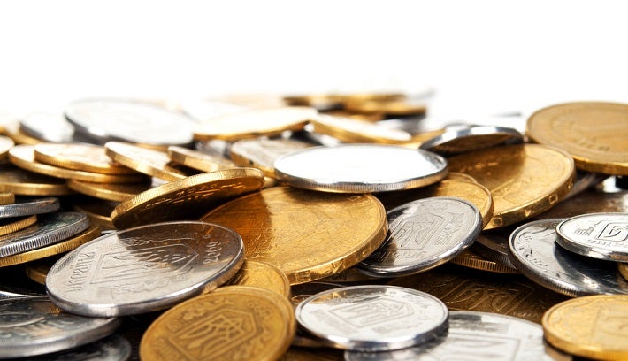 Image of a pile of lose gold and silver coins