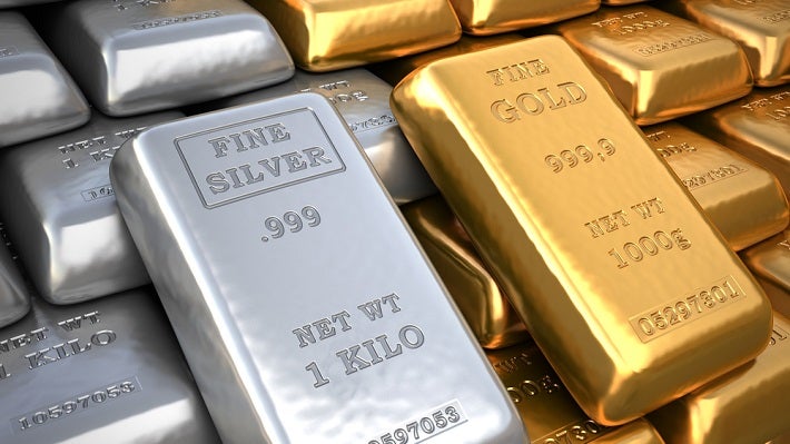 a pile of silver and gold bars