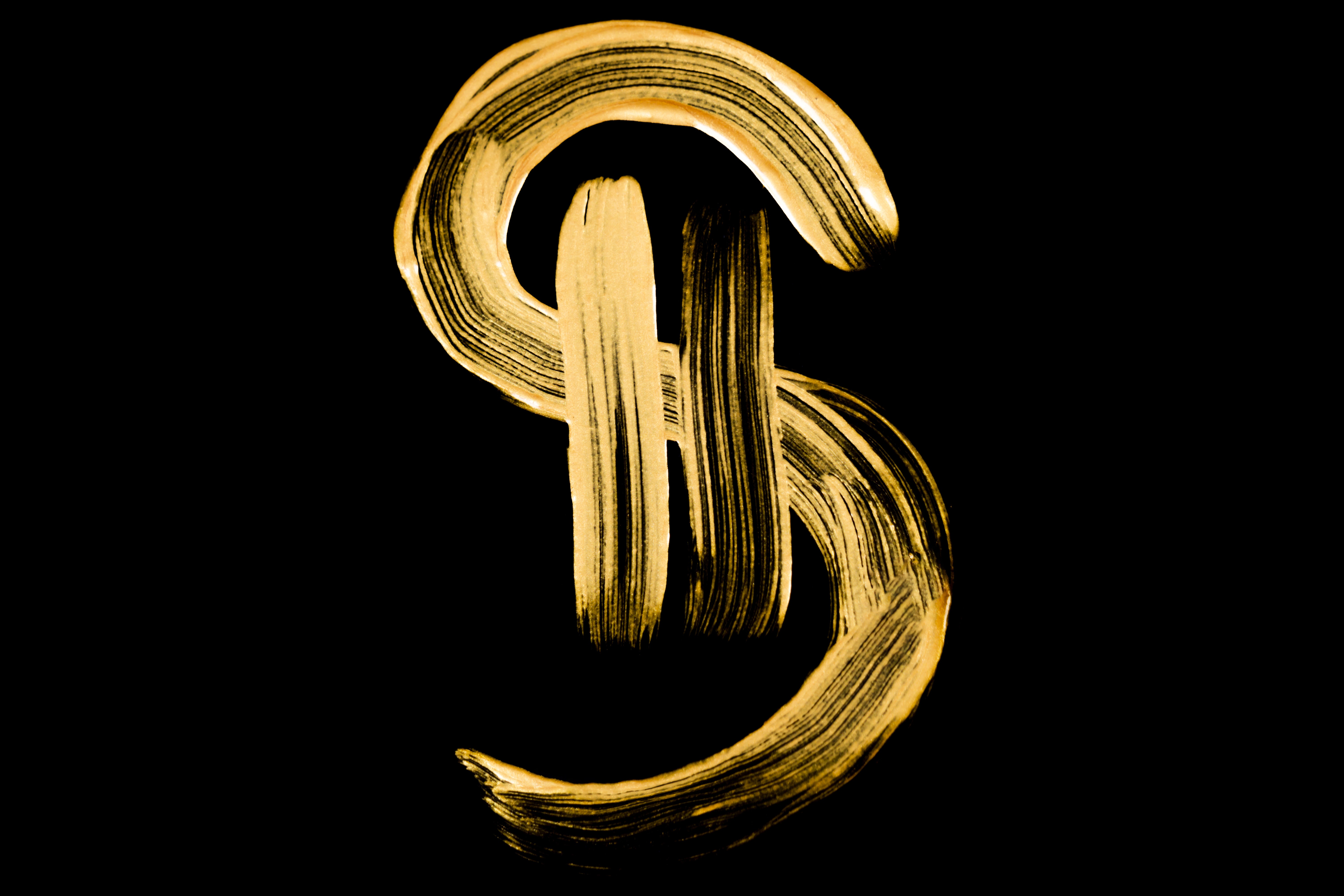 Image of Gold Money Sign on black background