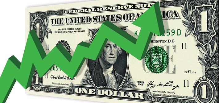 A green soaring graph shown with a dollar bill on the background