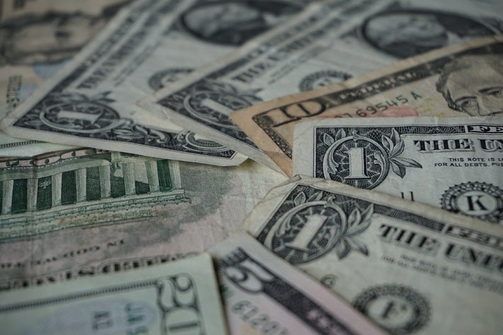 Image of US paper money in various denominations