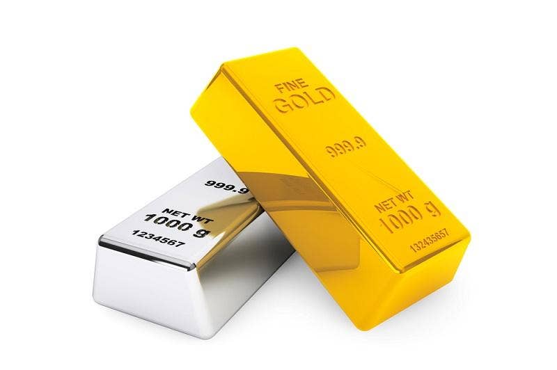 Image of a silver bar and a gold bar resting on silver in a slanting position