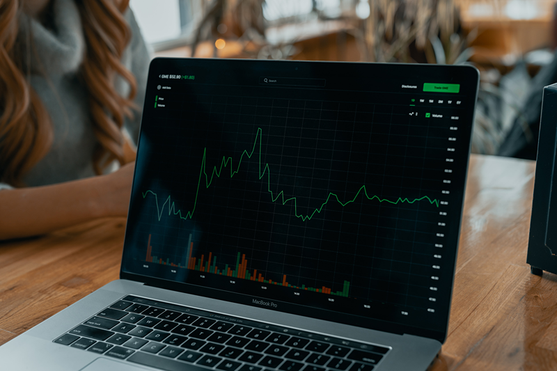 stock and finance charts on desk