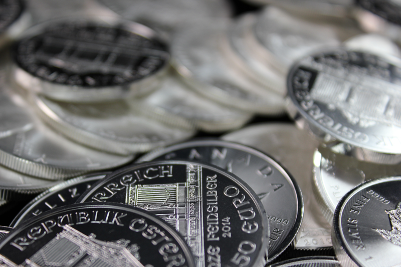 silver coin stack on table