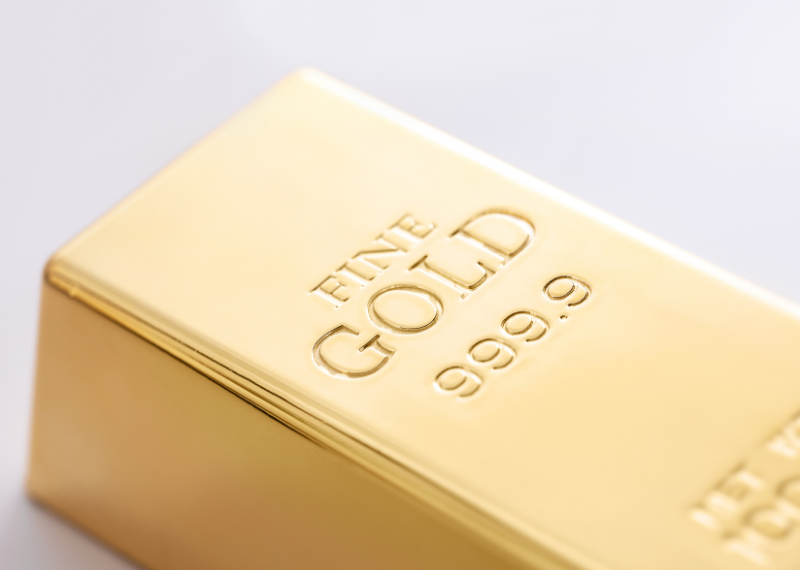 A zoomed in view of multiple gold coins