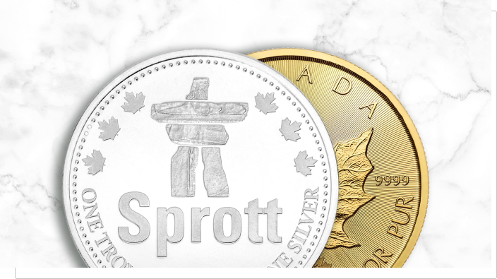 A silver coin with Sprott written on it, on top of a gold coin.