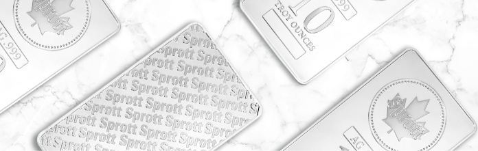 Top down view of four silver bars