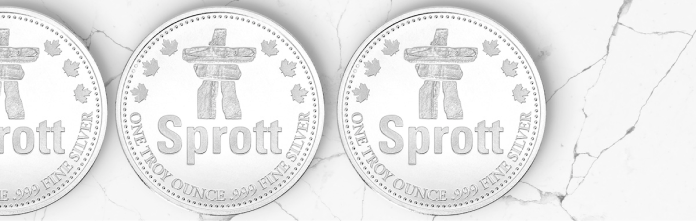 Top down view of three silver coins